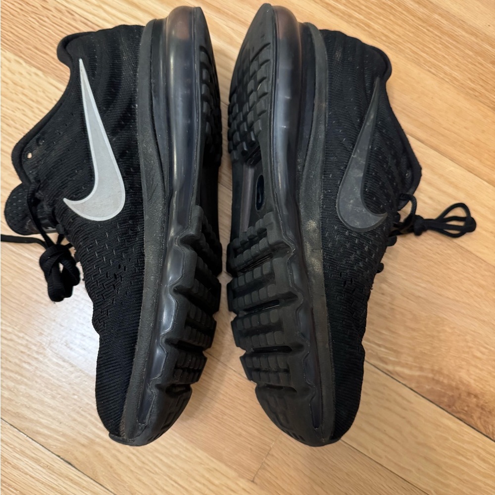 Nike Black Sneakers with Silver Logo
